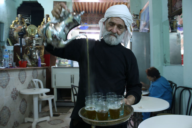 Mr. Berrada Ali Gerant pouring the group some mint tea.